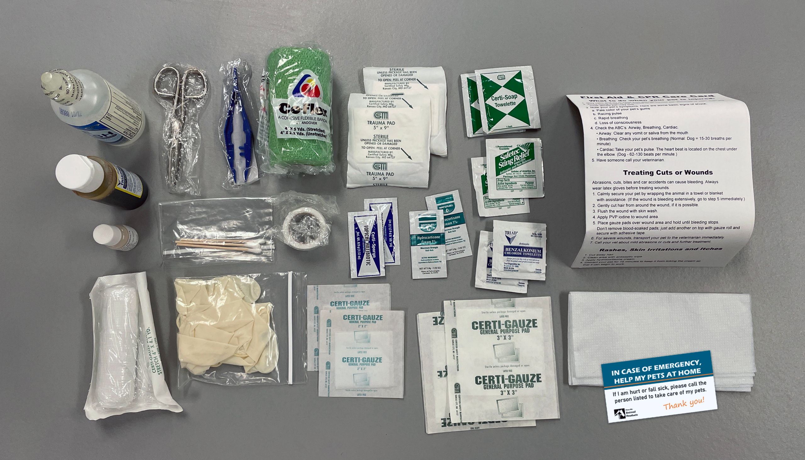 Hunting dog first aid contents with gunshot wound information instruction card