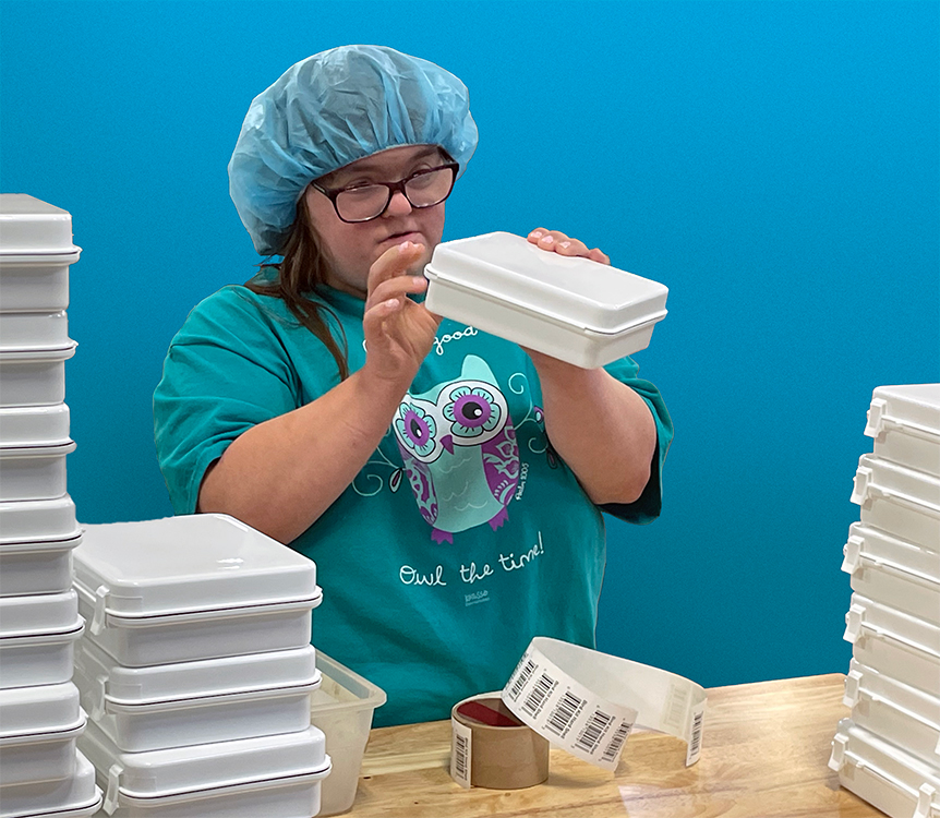 Show Me Animal kits being labels by VSI Employee